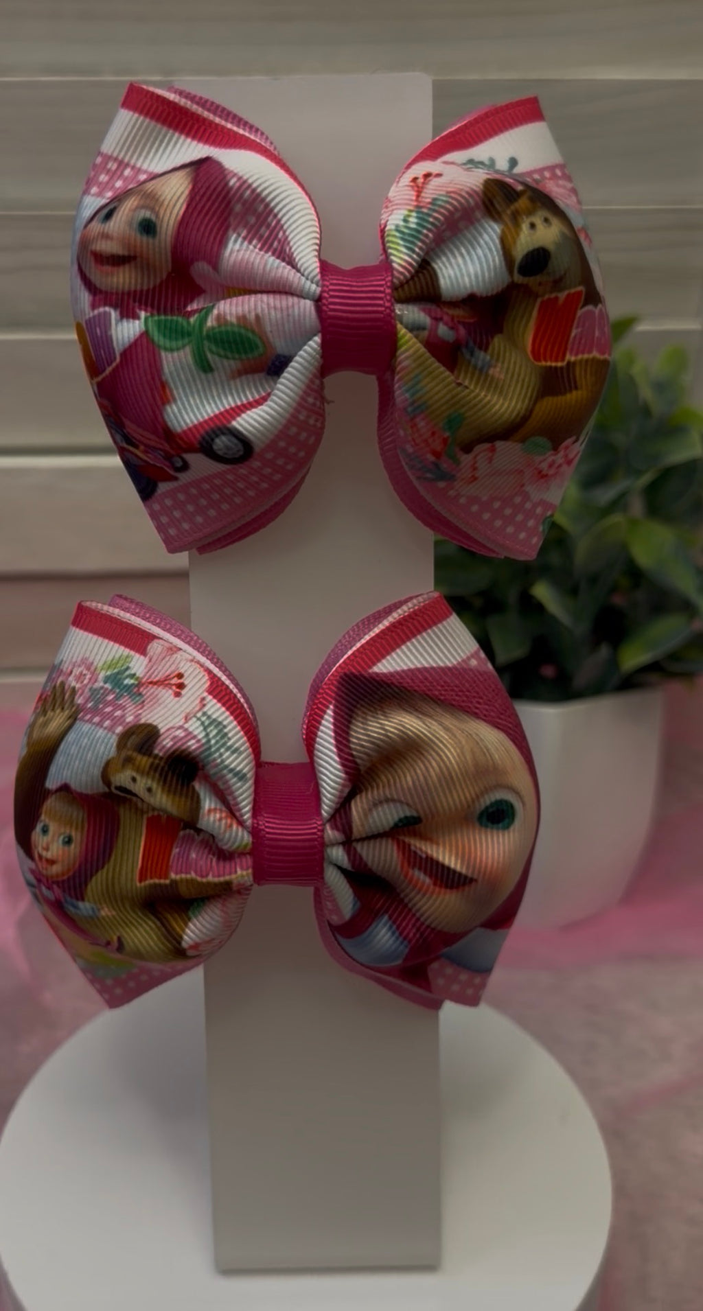 Two different, Marshals bear hair bow to pick